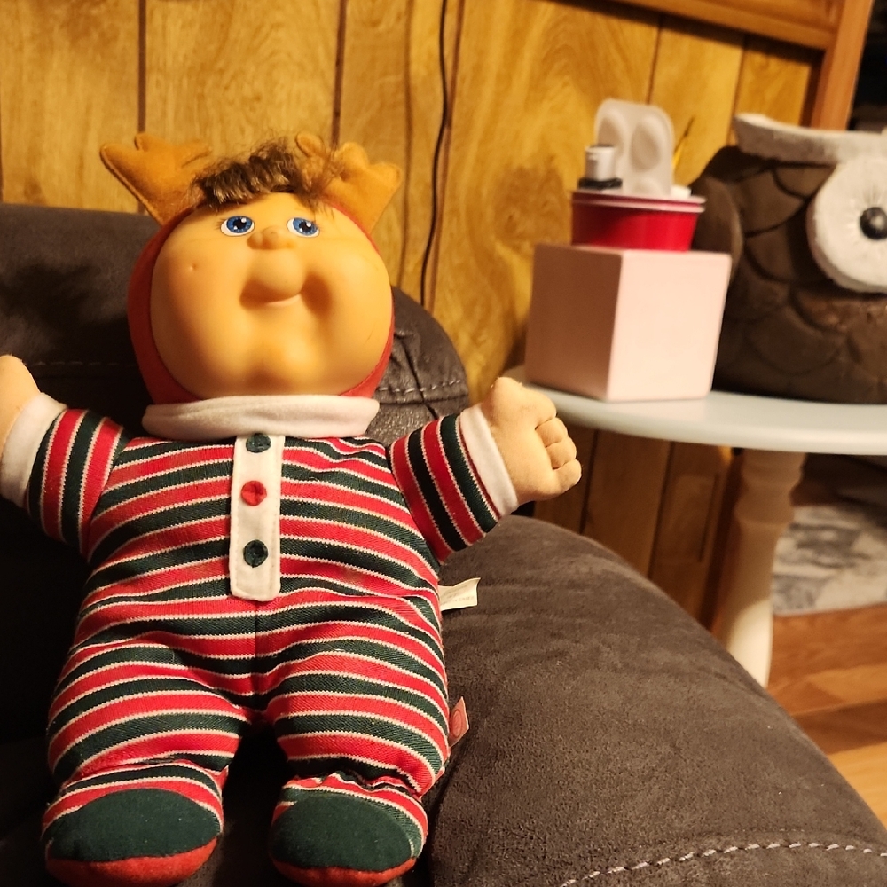 Festive Striped Reindeer Doll with Red and Green Outfit